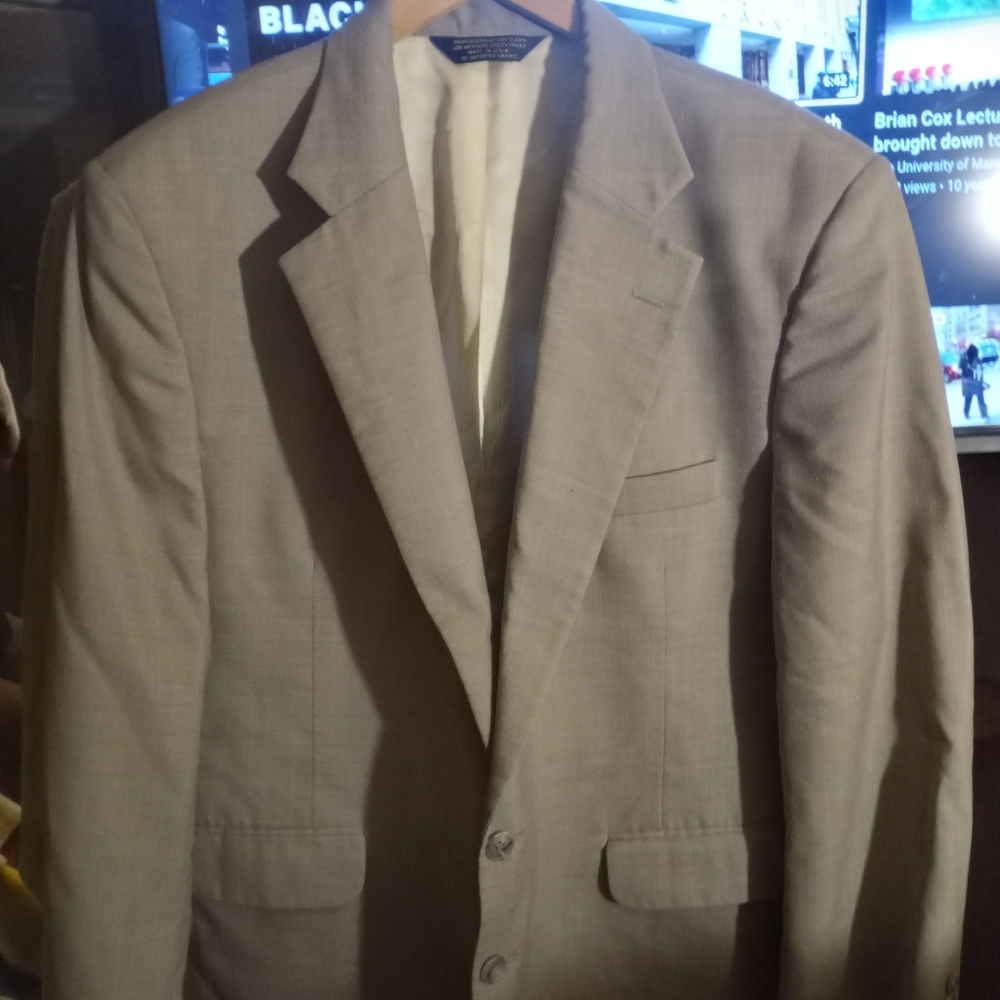 Adam's row light gray suit coat
